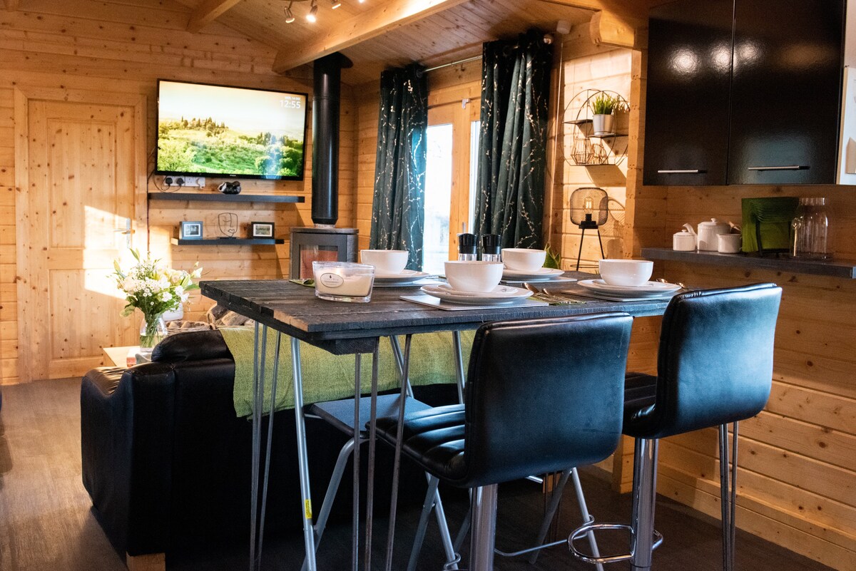 The furnished kitchen and living space at Keepers Cabin